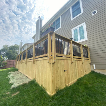 Pressure Treated Deck with Solid Skirting & Belgard Patio in Palatine, IL