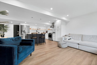 Minimalist basement photo in Toronto