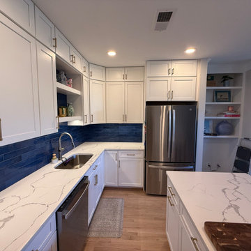Open-Concept White Kitchen Remodel with Navy Backsplash in Arlington, VA
