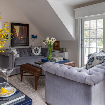 Sitting room with flanking tuxedo sofas