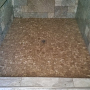 flat river rock shower floor