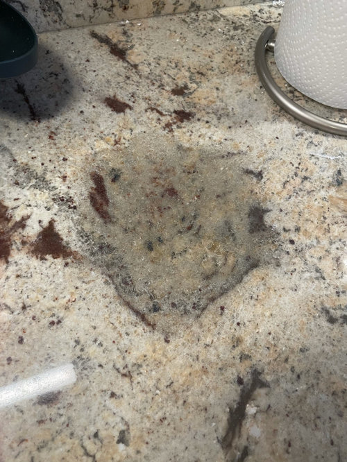 how to get water spots off granite counter