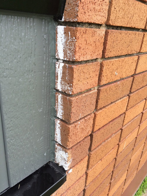 How to remove or hide paint drips from brick siding