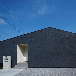 東京23区のモダンスタイルのおしゃれな平屋 (黒い外壁、切妻屋根、戸建、板屋根) の写真