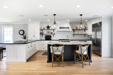 Example of a transitional kitchen design in New York