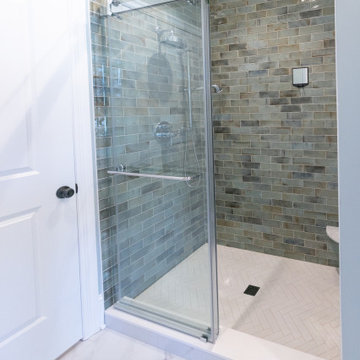 Primary Bathroom Remodel with Herringbone Flooring + Custom Shower