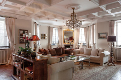 This is an example of a large traditional formal enclosed living room in Moscow with beige walls, dark hardwood floors, a stone fireplace surround and a corner fireplace.
