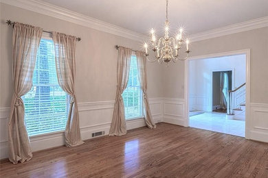 Example of a classic dining room design in Atlanta