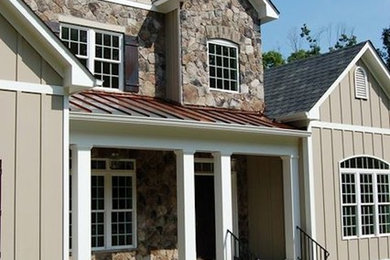Beige two-story exterior home idea in Richmond