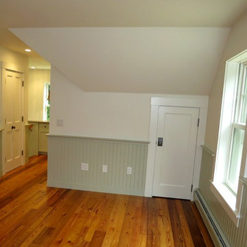 Garage apartment with green wainscotting