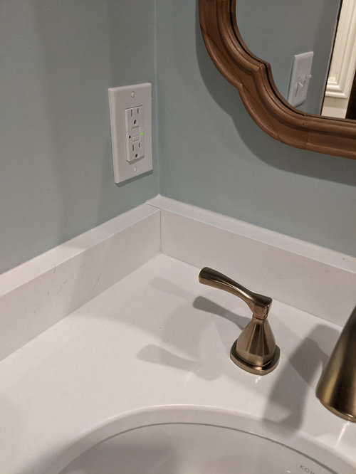 Correct way to install vanity backsplash