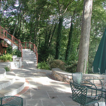 New patio and new stone steps to access upper deck