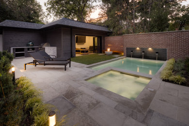 Inspiration for a small contemporary backyard stone and rectangular lap pool landscaping remodel in Toronto