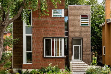 Example of a minimalist exterior home design in Ottawa