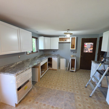 Photo 5 – Cabinet Installation Phase New shaker-style cabinetry installation und