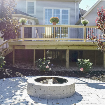 Deck and Unilock Paver Patio with Firepit & Landscaping