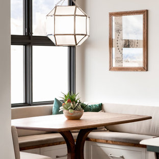Inspiration for a transitional medium tone wood floor and brown floor kitchen/dining room combo remodel in Albuquerque with gray walls
