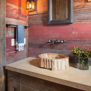 Example of a mountain style bathroom design in Austin with a vessel sink, shaker cabinets, dark wood cabinets and red walls