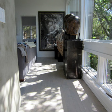 MONTAUK: MAPLE FLOORING SANDED WITH CUSTOM GREY STAIN AND BONA TRAFFIC HD