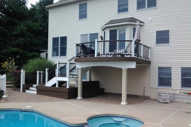 Example of a small classic backyard deck design in Philadelphia