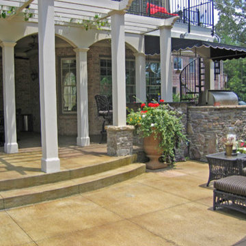 Olive concrete Terrace, Cypress Arbor and Fieldstone Grill and Bar