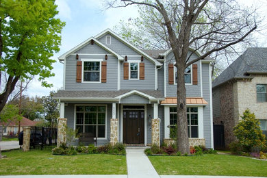 Inspiration for a large craftsman gray two-story wood exterior home remodel in Dallas