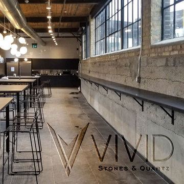 Honed Slate Restaurant Tables by Vivid Stones & Quartz Inc.