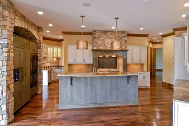 Kitchen - rustic kitchen idea in Other