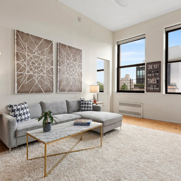 Staging a classic Brooklyn loft to spotlight 13' ceilings & oversized windows