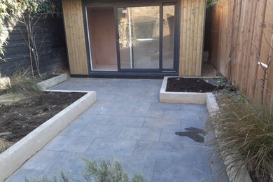 Contemporary Slate Tiling and Rendered Planter