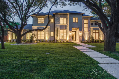 Inspiration for a transitional white two-story brick house exterior remodel in Dallas with a shingle roof