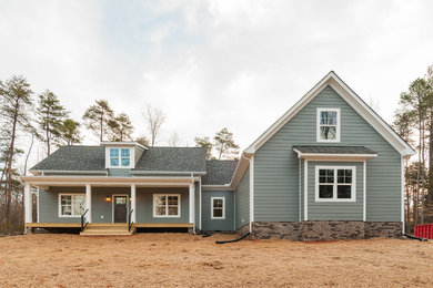 Gray two-story wood exterior home photo in Richmond with a shingle roof
