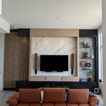 Custom Built-In Modern Entertainment Center with Wood Slatted Wall and Fireplace