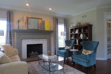 Family room - mid-sized contemporary enclosed dark wood floor and brown floor family room idea in Chicago with beige walls, no fireplace and no tv