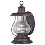Vaxcel - Dockside 8" Outdoor Wall Light Weathered Patina - Whether literally at the dock or simply dreaming of the seaside, this iconic nautical-style lantern from the Dockside collection illuminates the exterior of your home with brilliance and style. The weathered patina finish feels both worn and new, with clear glass for a clear view. Ideal for your porch, entryway, or any other area of your home.
