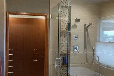 Inspiration for a large transitional master beige tile and porcelain tile porcelain tile bathroom remodel in Denver with an undermount sink, raised-panel cabinets, medium tone wood cabinets, granite countertops and gray walls