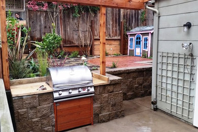 Inspiration for a mid-sized asian partial sun backyard brick landscaping in San Francisco.