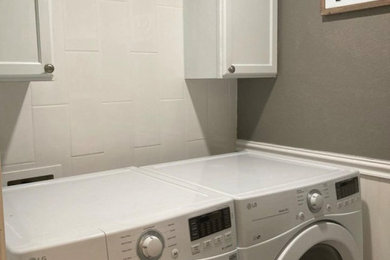 Inspiration for a contemporary laundry room remodel in Other