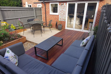 Photo of a small modern back full sun garden seating in Buckinghamshire with decking.