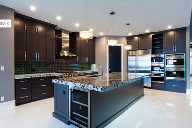 Transitional kitchen photo in Calgary with granite countertops