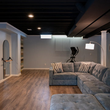 Finished Basement with Wet Bar and Half Bath in Commerce Twp, MI