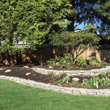 Upper & lower stacked walls with the largest Rhodo behind
