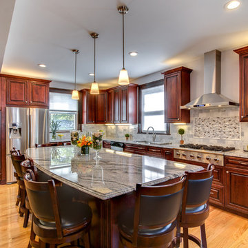 Viscont White granite countertops with Cherry cabinets