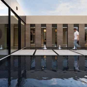 Bighorn Palm Desert luxury modern home walkway over water
