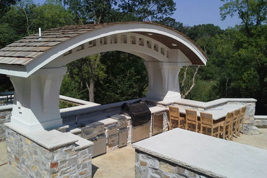 Inspiration for a large craftsman rooftop outdoor kitchen deck remodel in Minneapolis with no cover