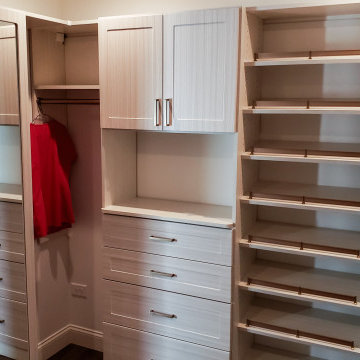 Custom master closet with full length mirror cabinet & matte gold hardware!