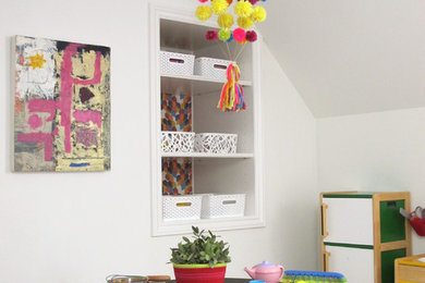 Eclectic gender-neutral carpeted playroom photo in Detroit with white walls