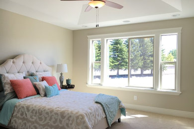 Mid-sized transitional master carpeted and beige floor bedroom photo in Other with beige walls