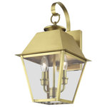Livex Lighting - Wentworth 2 Light Natural Brass Outdoor Medium Wall Lantern - With its appealing natural brass finish and clear glass, the stunning Mansfield collection will make an elegant addition to any outdoor space. Formed from solid brass & traditionally inspired, this downward hanging two-light outdoor medium wall lantern is perfect for a driveway, back porch or entry way. With superb craftsmanship and affordable price, this fixture is sure to be a timeless addition to your home.
