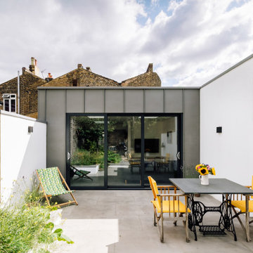 Side and rear extension with a courtyard